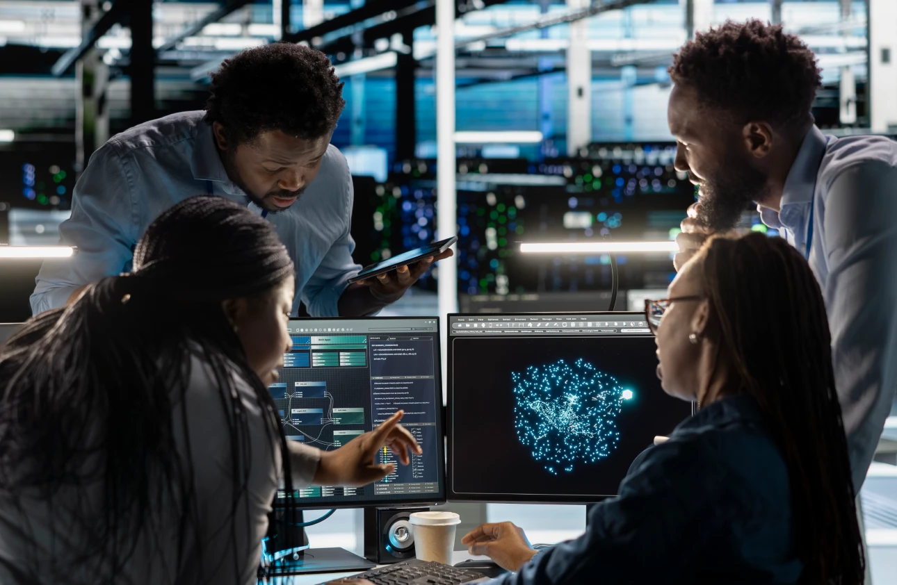 Data and AI specialists collaborating on machine learning and advanced analytics solutions in a modern technology environment